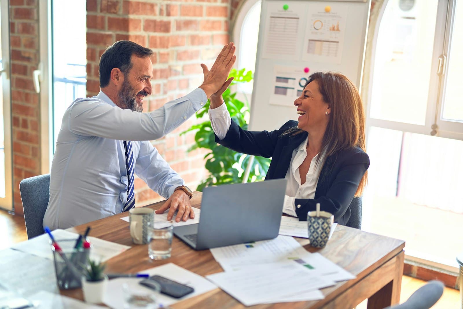 Business professionals working together on funding solutions