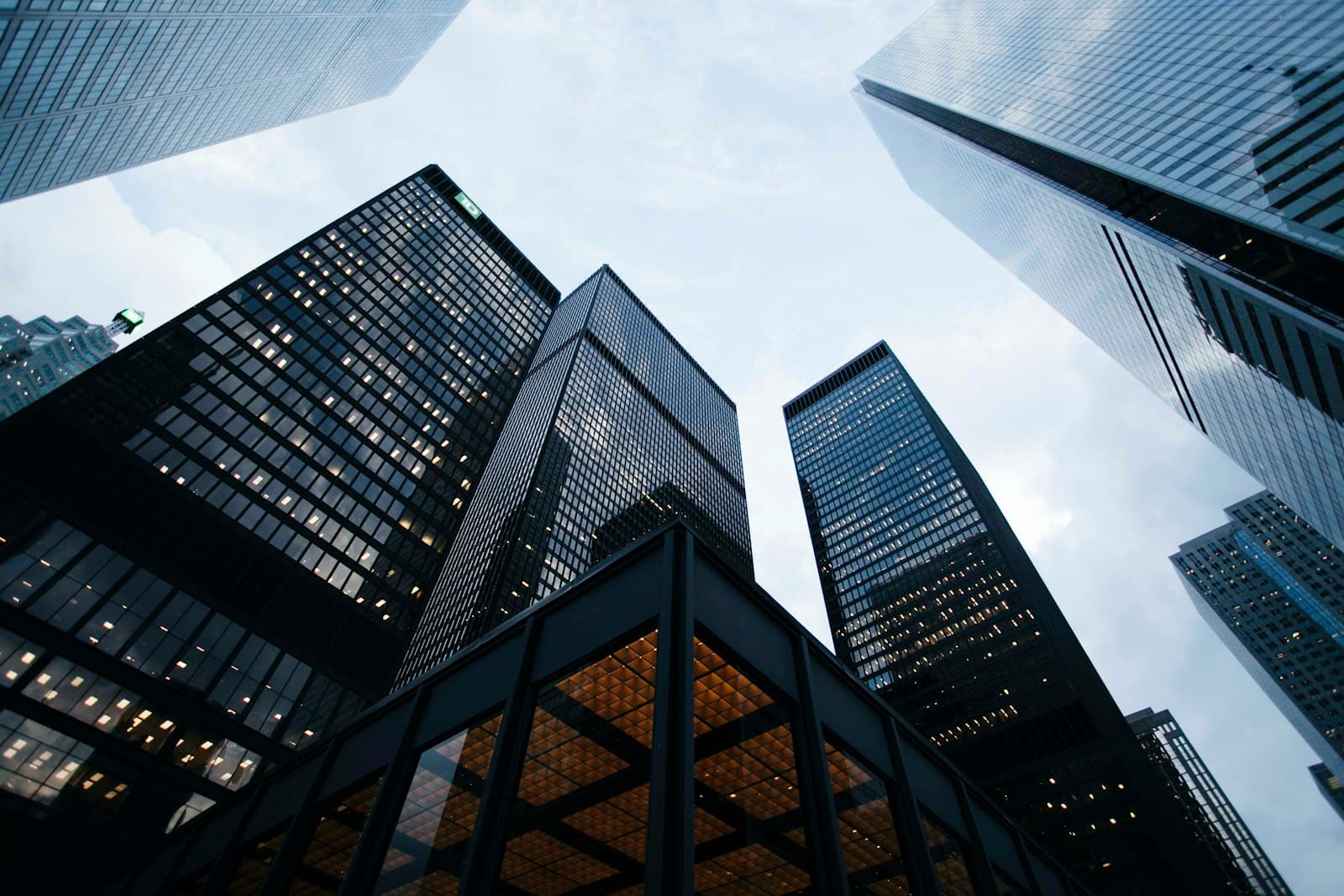 Modern commercial office building with glass facade in an urban setting