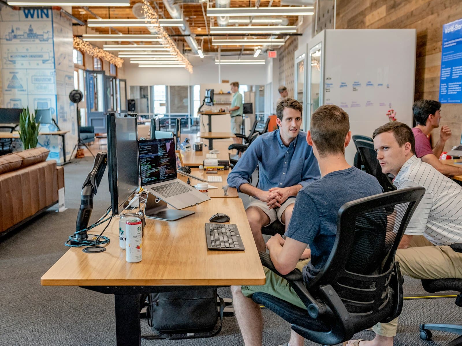 Business professionals collaborating in a modern office meeting